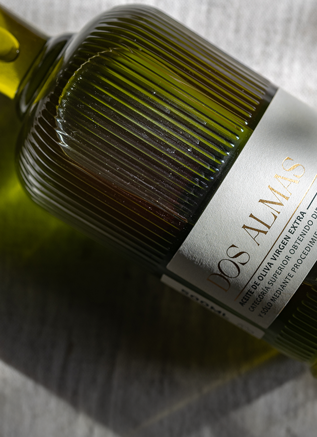 Dos Almas premium olive oil bottle with custom label design